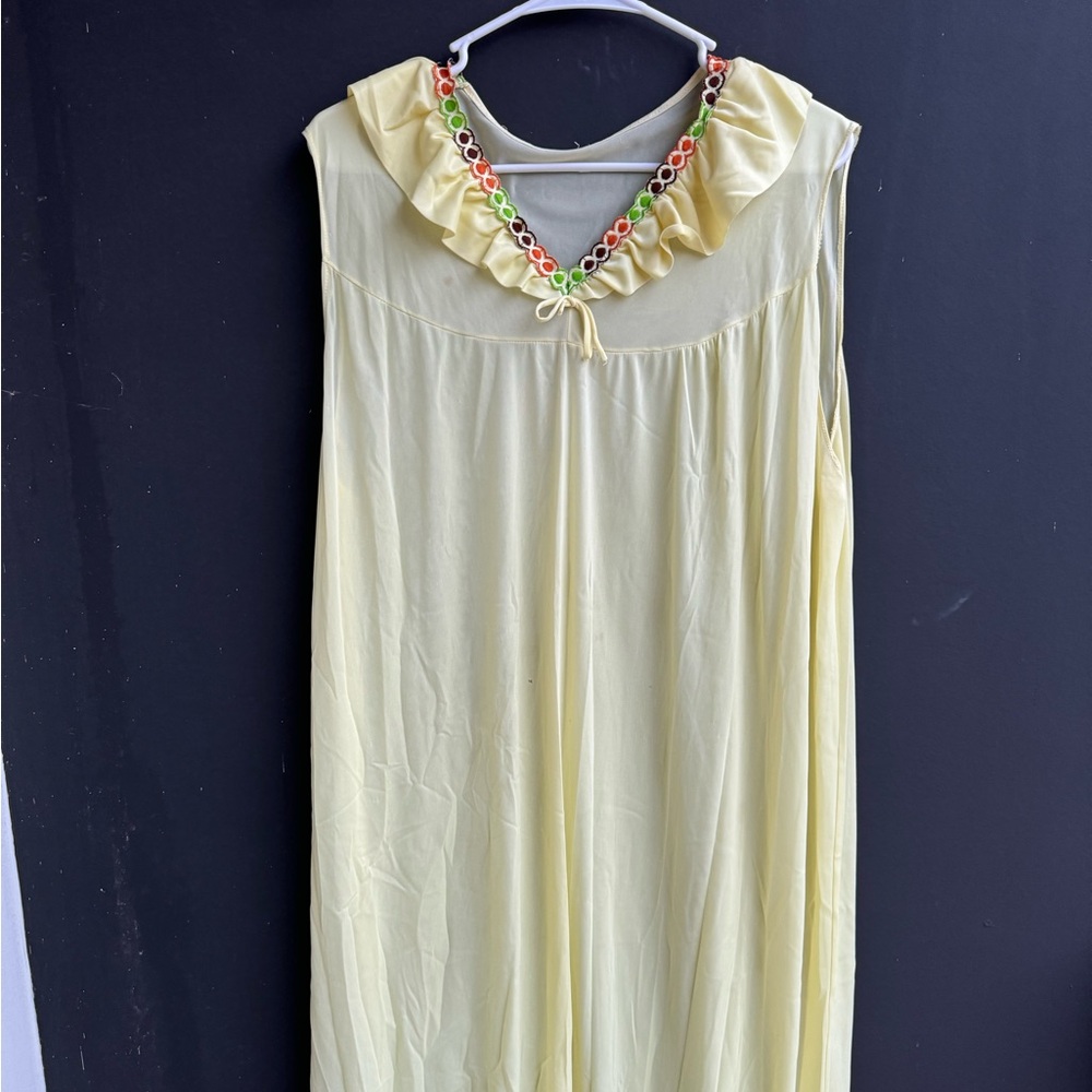 Vintage nylon lace ruffle nightgown in pale yellow.